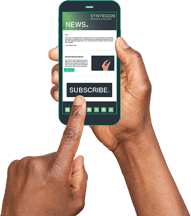 Hands holding a smartphone with newsletter subscription website page